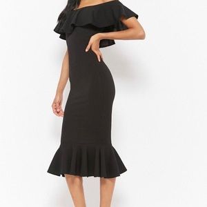 Flounced Off the shoulder black dress. Never worn